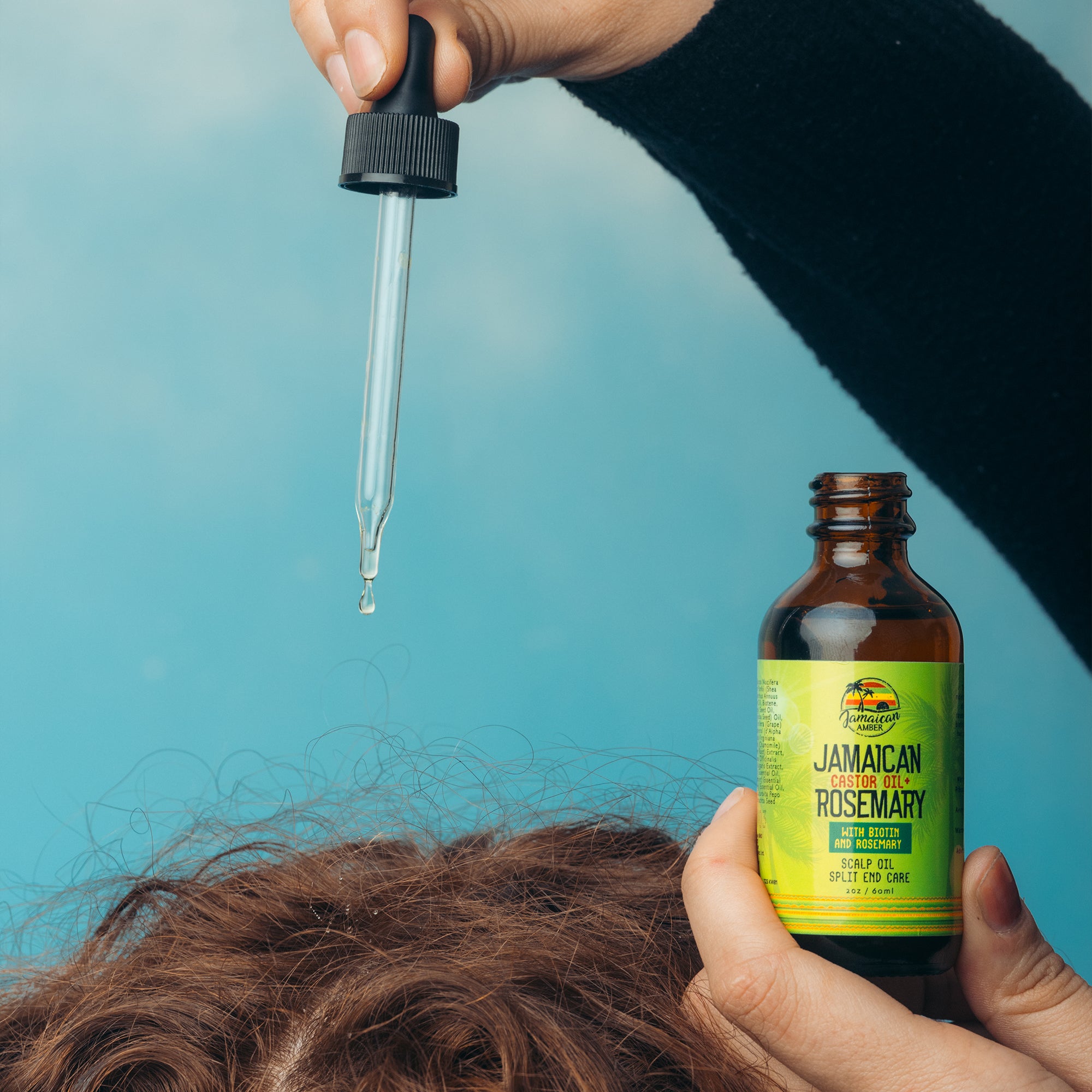 Jamaican Amber Jamaican Castor Oil & Rosemary Hair Oil  2 oz/60 ml
